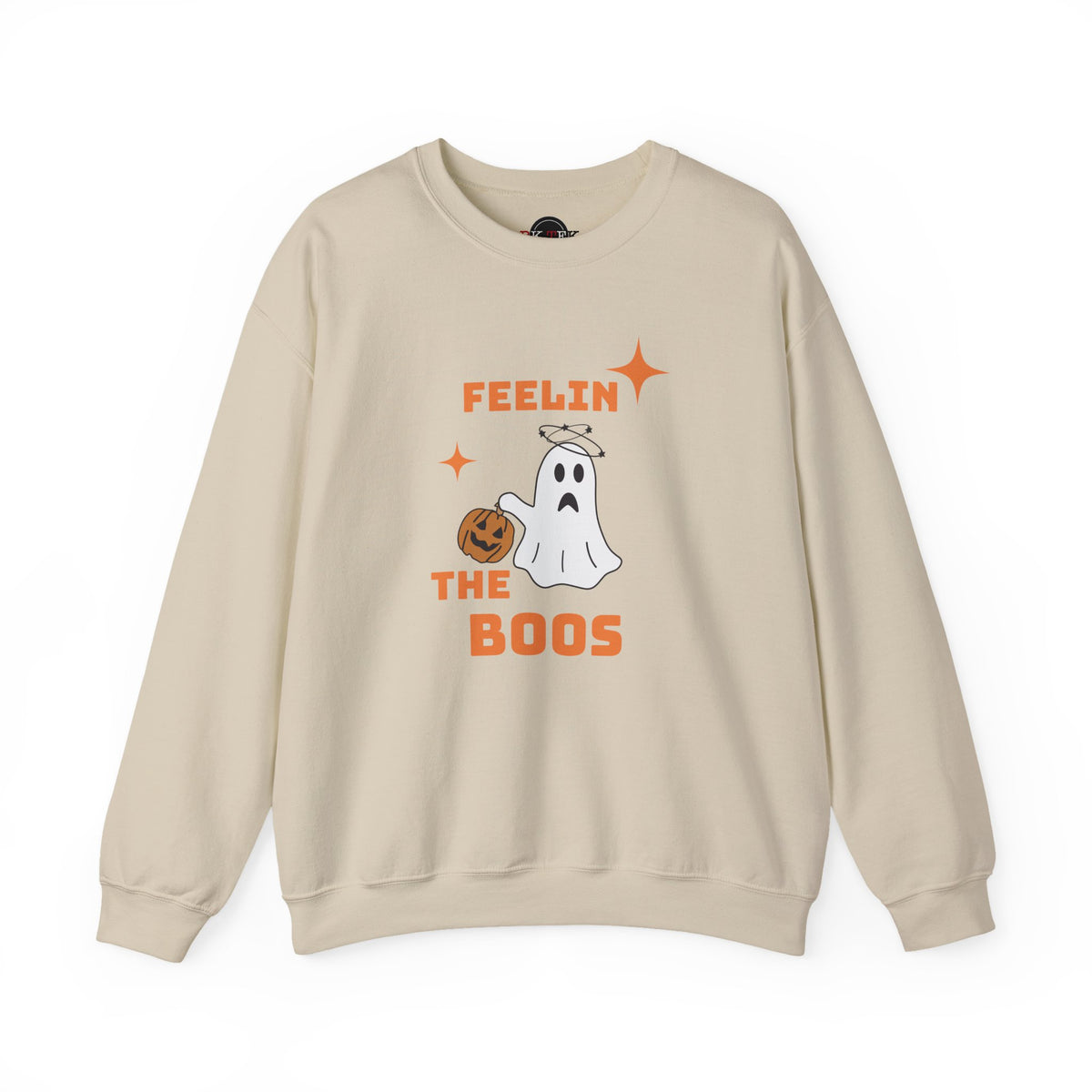 A beige crewneck sweatshirt featuring a Halloween graphic with the text 'FEELIN THE BOOS' in orange, a white ghost with a halo, and a small orange jack-o'-lantern.