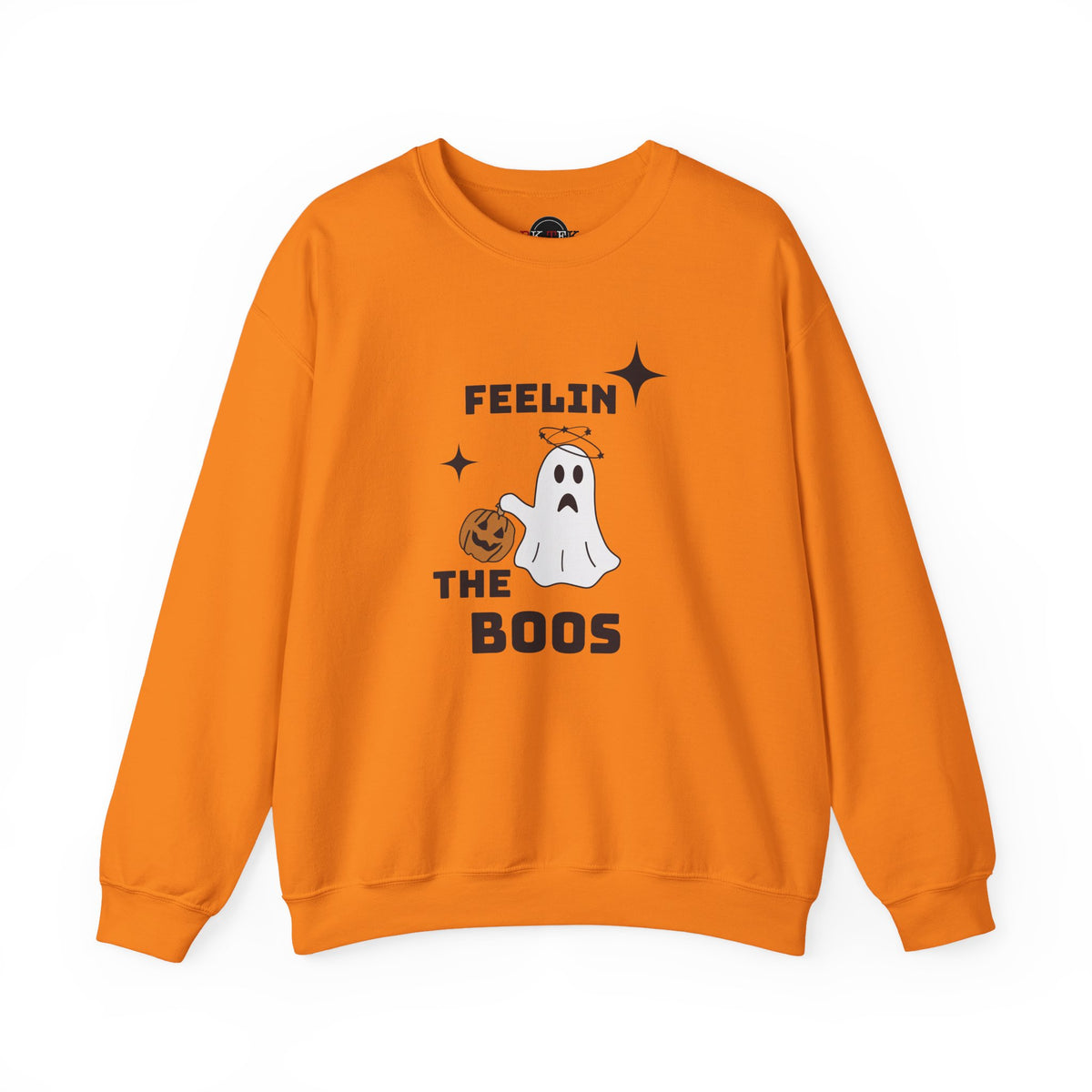 An orange crewneck sweatshirt featuring a Halloween graphic with the text 'FEELIN THE BOOS' and an illustration of a sad white ghost holding a jack-o'-lantern.