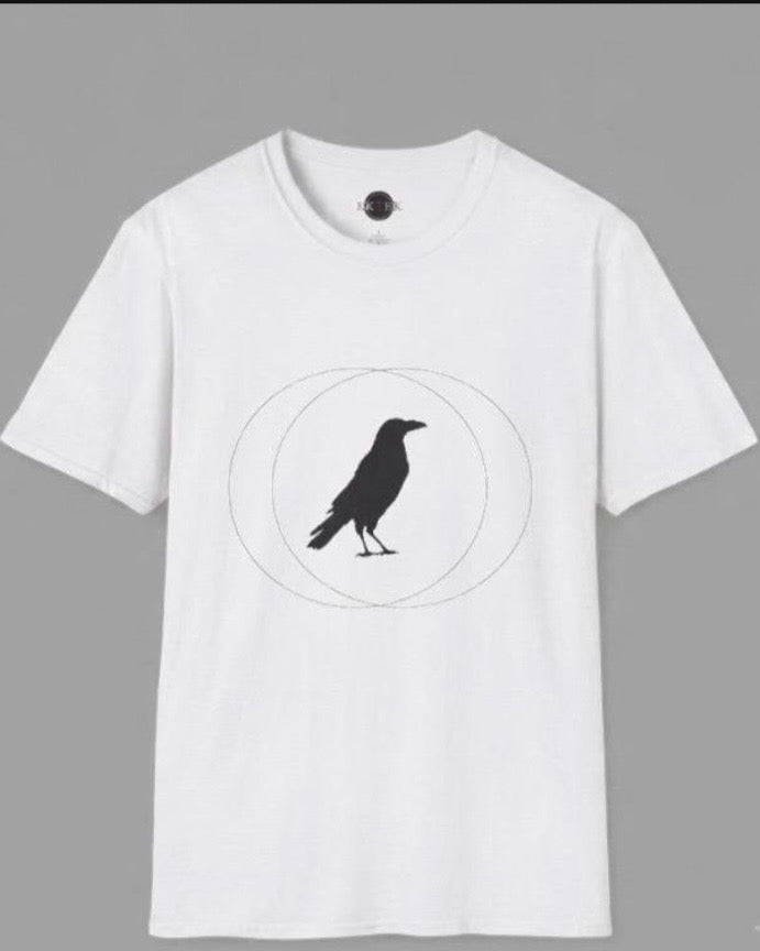 A white short-sleeve crewneck t-shirt featuring a black crow silhouette centered within two intersecting thin circles on the chest, displayed against a solid gray background.