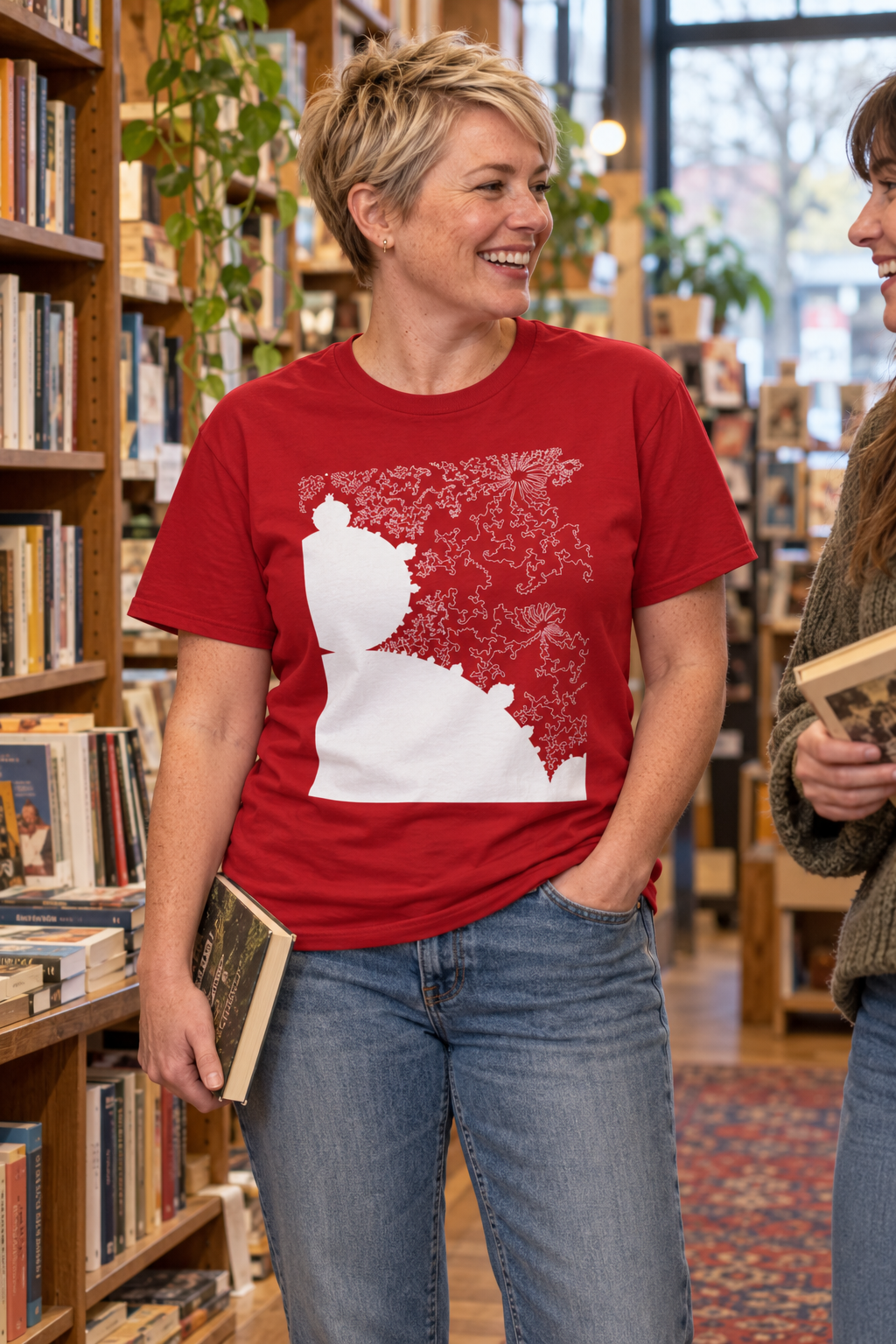 Woman wearing a red Mandelbrot Fractal shirt in a bookshop
