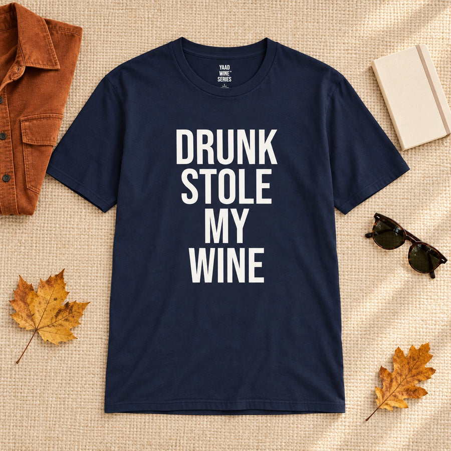 Navy Drunk Stole My Wine shirt laid flat with autumn accessories