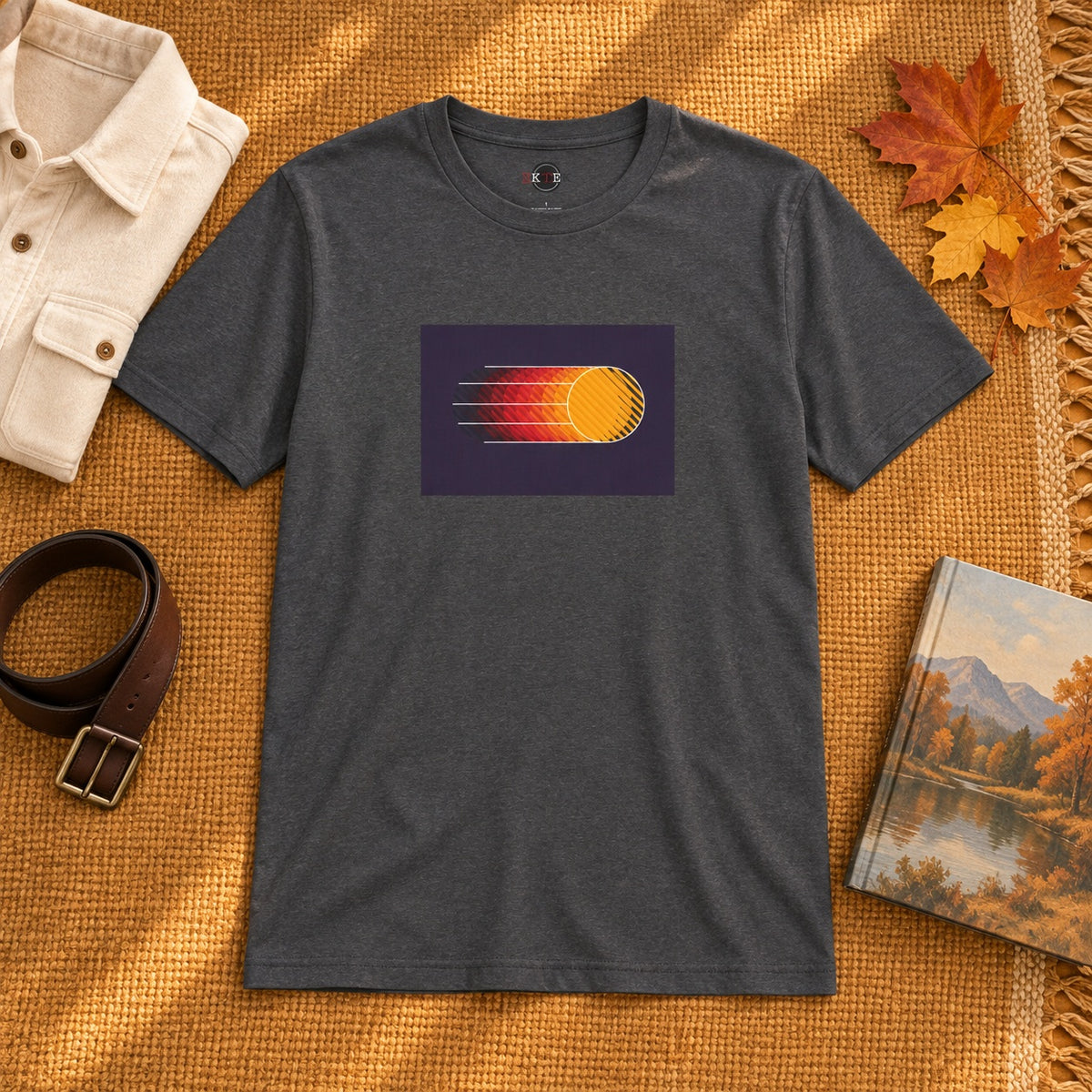 Dynamic Abstract graphic T-shirt in Dark Heather styled in a warm early-autumn flat lay