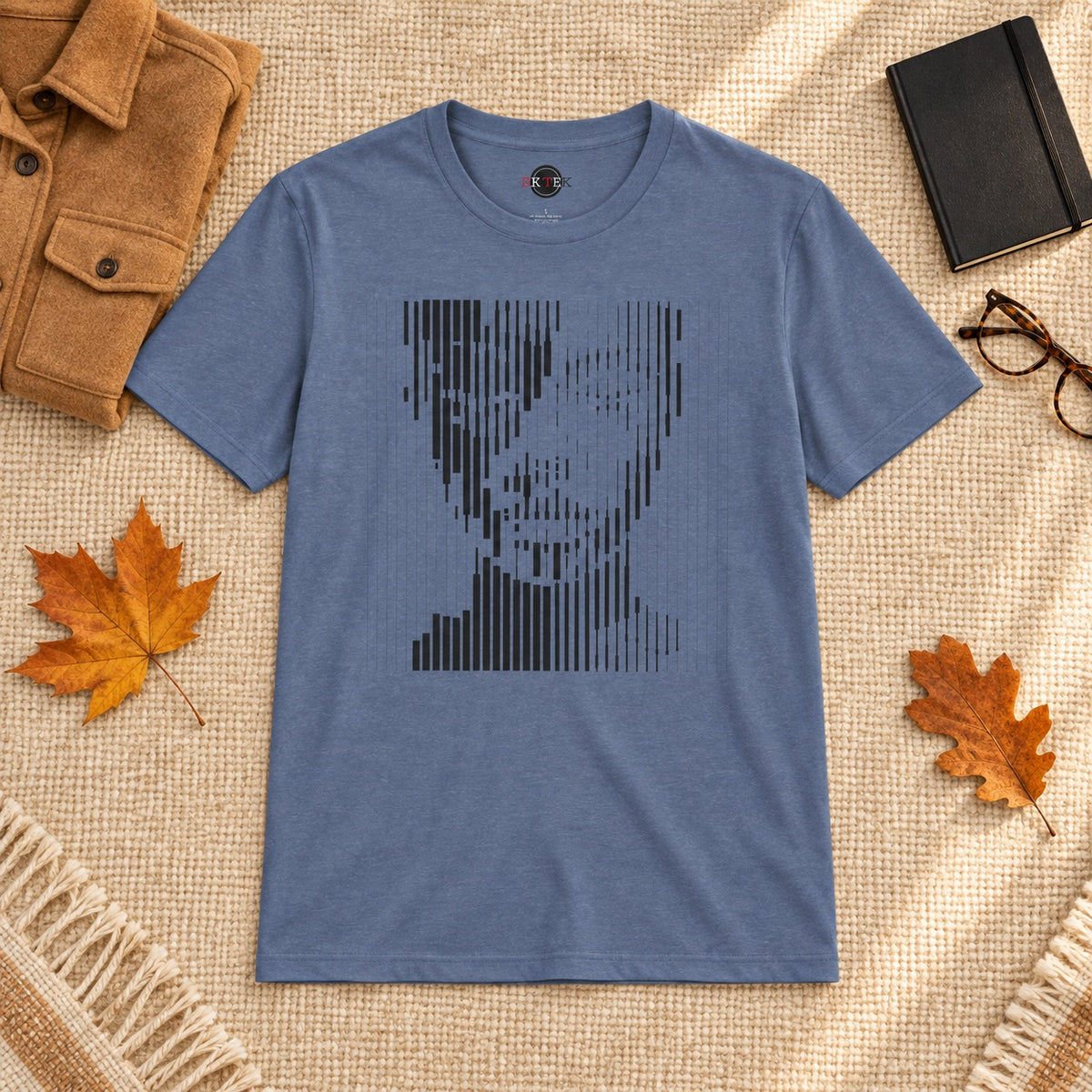 Face Paint abstract portrait T-shirt in Heather Indigo styled in a warm early-autumn flat lay