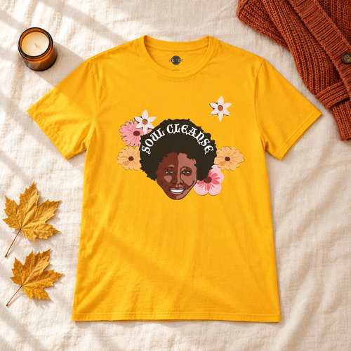 Gold Black Girl Soul Cleanse shirt in a bright autumn flat lay