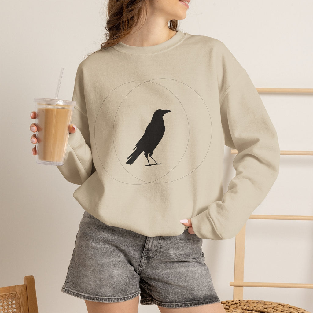 Sand Wise Crow sweatshirt shown in a casual lifestyle setting